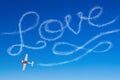 Love figurative inscription from a white smoke trail airplane