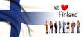 We love Finland , A group of people pose next to the Finnish flag Royalty Free Stock Photo