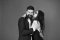 Love at first bite. Couple in love enjoy flirtation. Flirtation between sexy girl and bearded man. Flirtation and Royalty Free Stock Photo