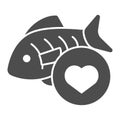 Love fishing solid icon. Fish and heart vector illustration isolated on white. Love seafood glyph style design, designed