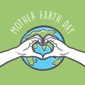 Love hand sign and earth between the hands celebrating Mother earth day.