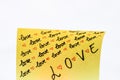 Love handwriting text close up isolated on yellow paper with copy space