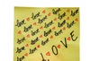 Love handwriting text close up isolated on yellow paper with copy space