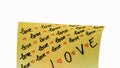 Love handwriting text close up isolated on yellow paper with copy space