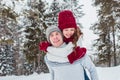 Love - Happy couple having fun smiling happy laughing together on romantic holidays. Young man giving piggyback ride to Royalty Free Stock Photo