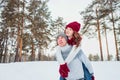 Love - Happy couple having fun smiling laughing together on romantic holidays. Young man giving piggyback ride to his Royalty Free Stock Photo