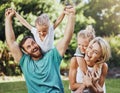 Love, happy and family playing in a park, laugh and relax while having fun together. Freedom, kids and caring parents Royalty Free Stock Photo