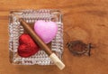 Love and harmful habit in a glass ashtray Royalty Free Stock Photo