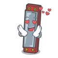 In love harmonica mascot cartoon style Royalty Free Stock Photo