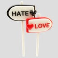 Love and hate glossy signpost signs