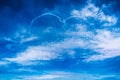 Love heart cloud drawing by airplane on airshow. Love concept for travelling the world