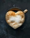 Love heart in coffee foam, topdown, warm morning light , advertise photo Royalty Free Stock Photo