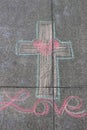 `Love` heart on cross rainbow sidewalk chalk art
