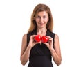 Love heart, protect and healthcare concept : Caucasian woman holding red heart on her chest and heart position isolated on white Royalty Free Stock Photo