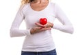 Love heart, protect and healthcare concept : Caucasian woman holding red heart on her chest and heart position isolated on white Royalty Free Stock Photo