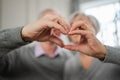 Love heart shape peace. Senior older couple making heart shape with their hands. Adult mature old husband wife showing