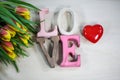 Love with heart and tulips, for Valentine`s Day, birthday, card Royalty Free Stock Photo