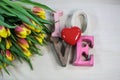 Love with heart and tulips, for Valentine`s Day, birthday, card Royalty Free Stock Photo