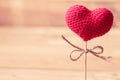 Love heart yarn on wood stick.