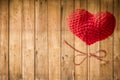 Love heart yarn on wood stick over wood