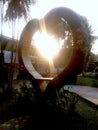 A love hearth-shaped chair confronts sunlight create backlight Silhouette photography