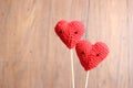 Love hearts on brown wood texture background, light soft tone,