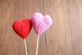 Love hearts on brown wood texture background, light soft tone,