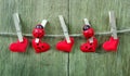 Love hearts hanging on rope on a wooden background. Love concept. Valentine`s day card. copy spaces Royalty Free Stock Photo