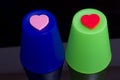 Love hearts on plastic cups Royalty Free Stock Photo