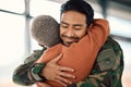 Love, hug and a man soldier with his wife in the airport after returning home from war service as a patriot. Smile Royalty Free Stock Photo