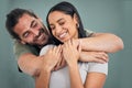Love, hug and support of a couple in a home with smile, care and affection. Trust, help and embrace of marriage or young Royalty Free Stock Photo