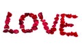 Love inscription from red rose petals Royalty Free Stock Photo