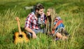 Love inspires them. Boyfriend and girlfriend with guitar. Romantic walk. Romantic song. Fresh air and pure feelings