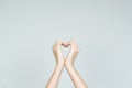 Love and kindness concept: hands forming the shape of heart.