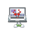 In love laptop cartoon mascot on white background. Royalty Free Stock Photo