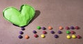 A love letter composed of candy. Spilled hearts