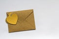 Love letter envelope with paper hearts on white background. Happ