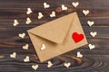 Love letter envelope with red heart on wooden background Royalty Free Stock Photo