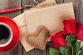 Love letter notepad, red roses and coffee cup Royalty Free Stock Photo