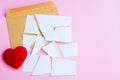 Love letter torn with red hearts Royalty Free Stock Photo