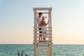 Love pair guy girl tower lifeguard paradise sunrise life safety, concept surf saving for station and security water