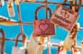 Love lock with german text, Sehen, Verlieben, Bleiben, means see, fall in love, stay Royalty Free Stock Photo