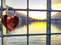 Love lock with sunset in background Royalty Free Stock Photo