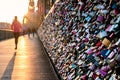 Love locks on the bridge in evening light. Royalty Free Stock Photo