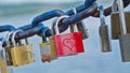Love locks on a chain fencing Balaton lake Royalty Free Stock Photo