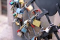 Love locks hang from bridge in Prague representing secure friendship and romance. Padlocks of lovers on bridge as symbol of love. Royalty Free Stock Photo