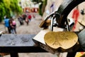 Love locks hanging in bridge with heart shaped padlock - symbol of of love, friendship and romance, Paris, France