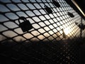 Love locks padlocks on bridge fence during sunset warm color Royalty Free Stock Photo