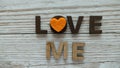 Love me wooden words quote for love.