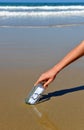 Love message in a bottle on the sand of the beach Royalty Free Stock Photo